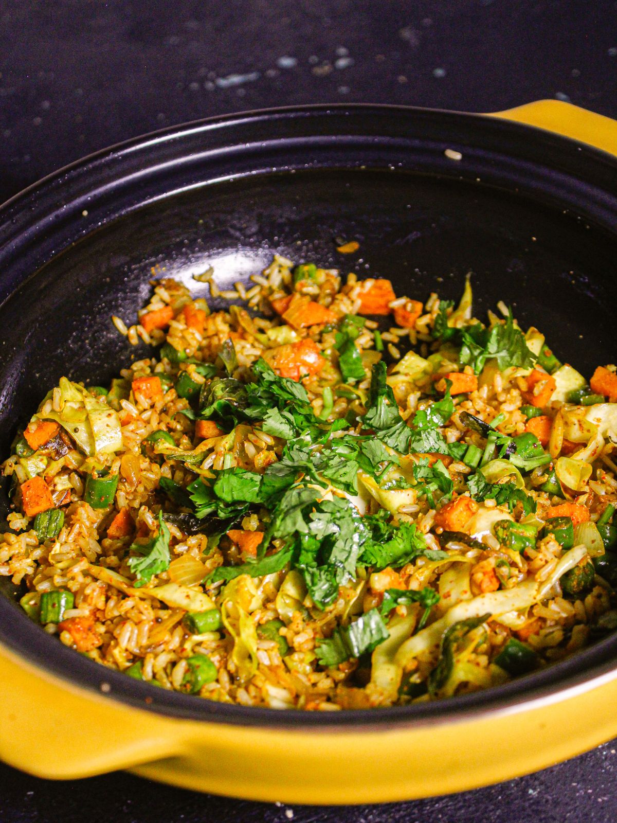 Garnish the rice with fresh coriander leaves and serve hot 