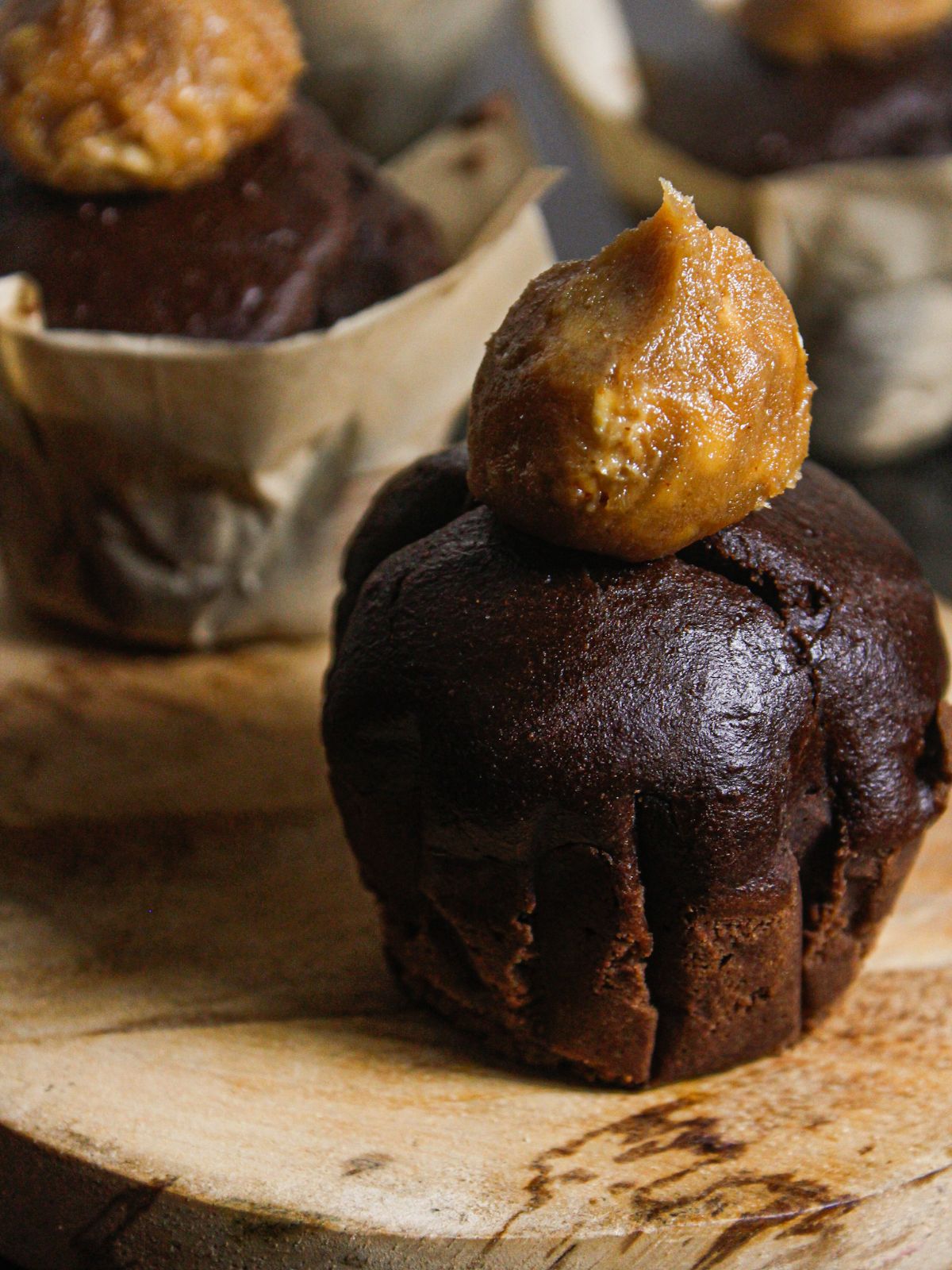 Side view of Chocolatey Cupcakes with Peanut Butter Frosting