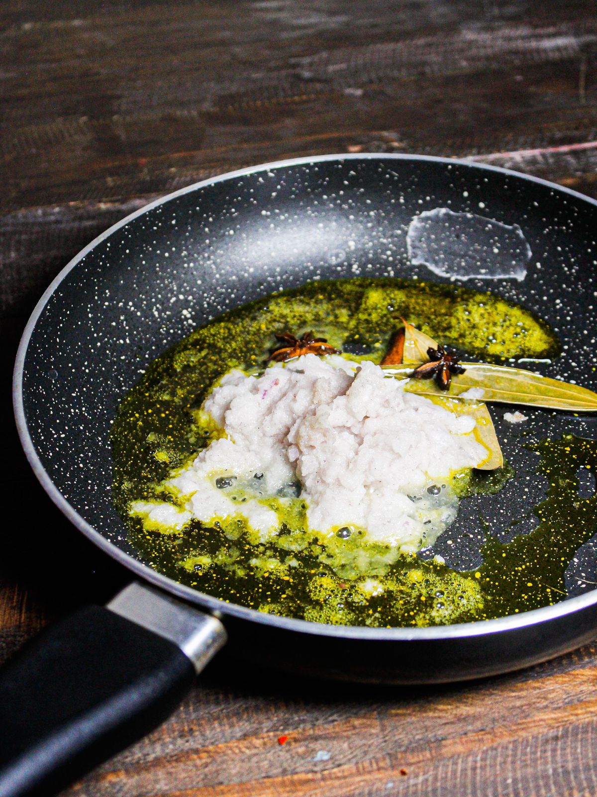 Add onion paste to the pan 