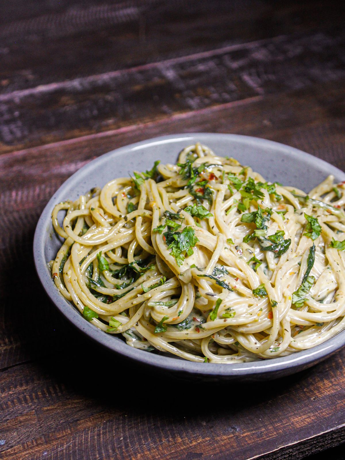 Delicious Lemony Whole Wheat Spaghetti with Garlic and Spinach ready to enjoy 