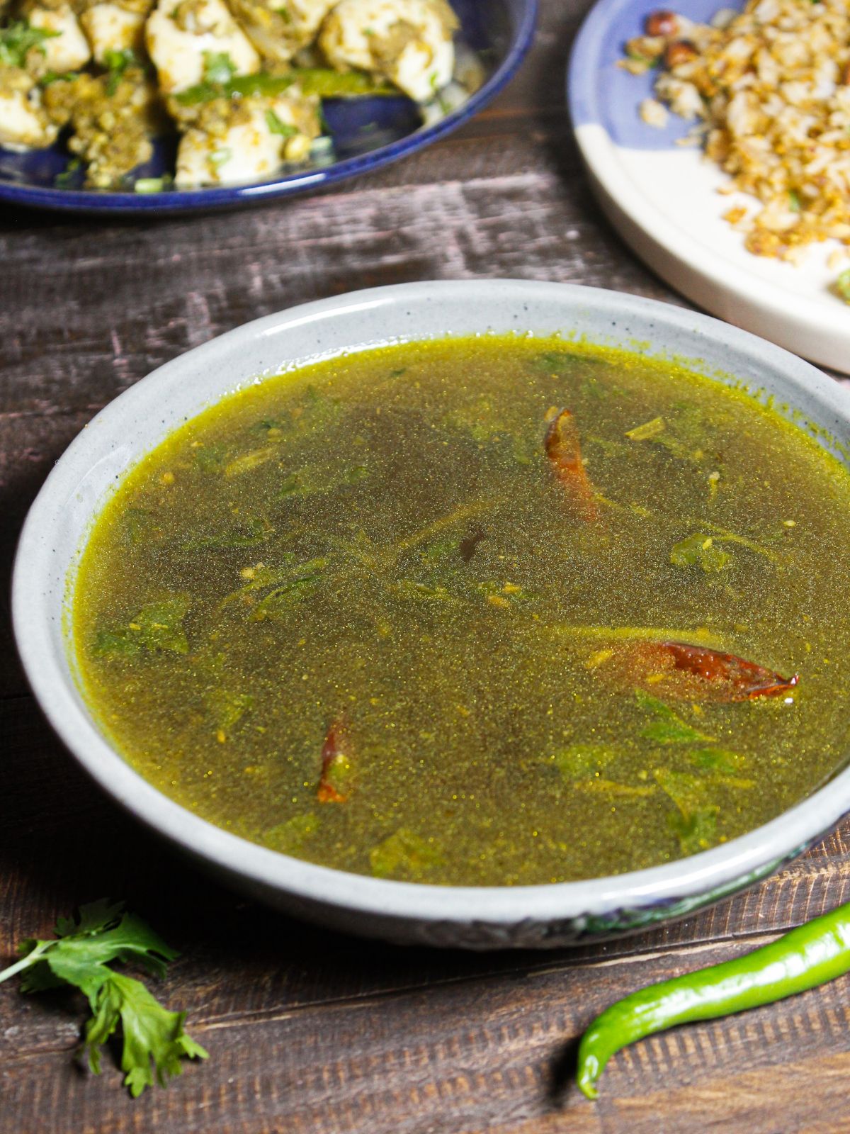 Once cooked well garnish Tamarind Rasam with fresh chopped coriander leaves and enjoy 