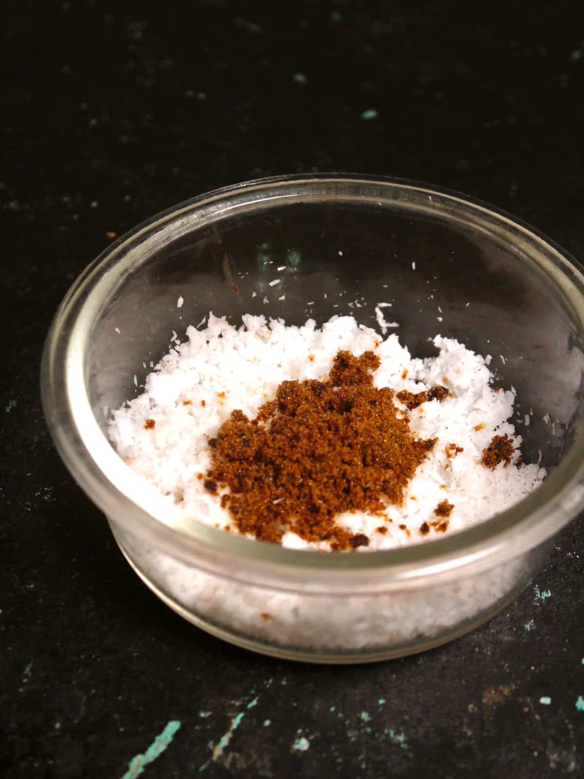 Mix coconut and jaggery in a bowl 