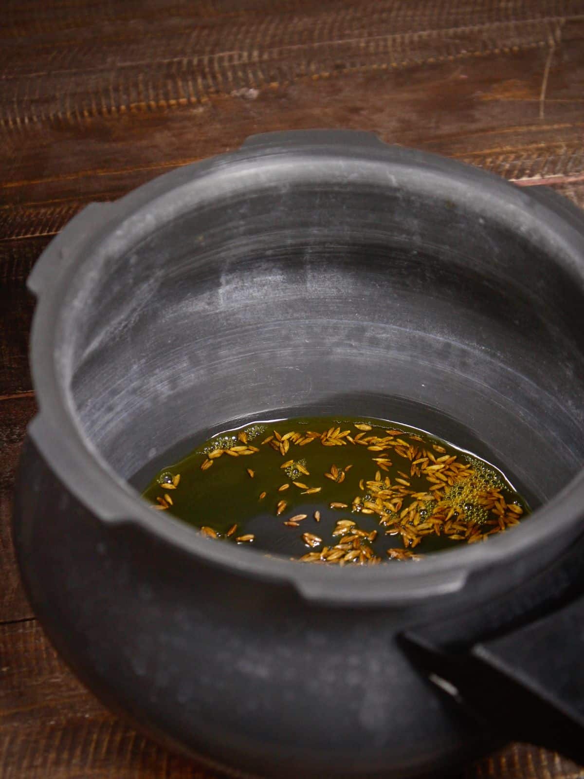 Cumin seeds in a vessel