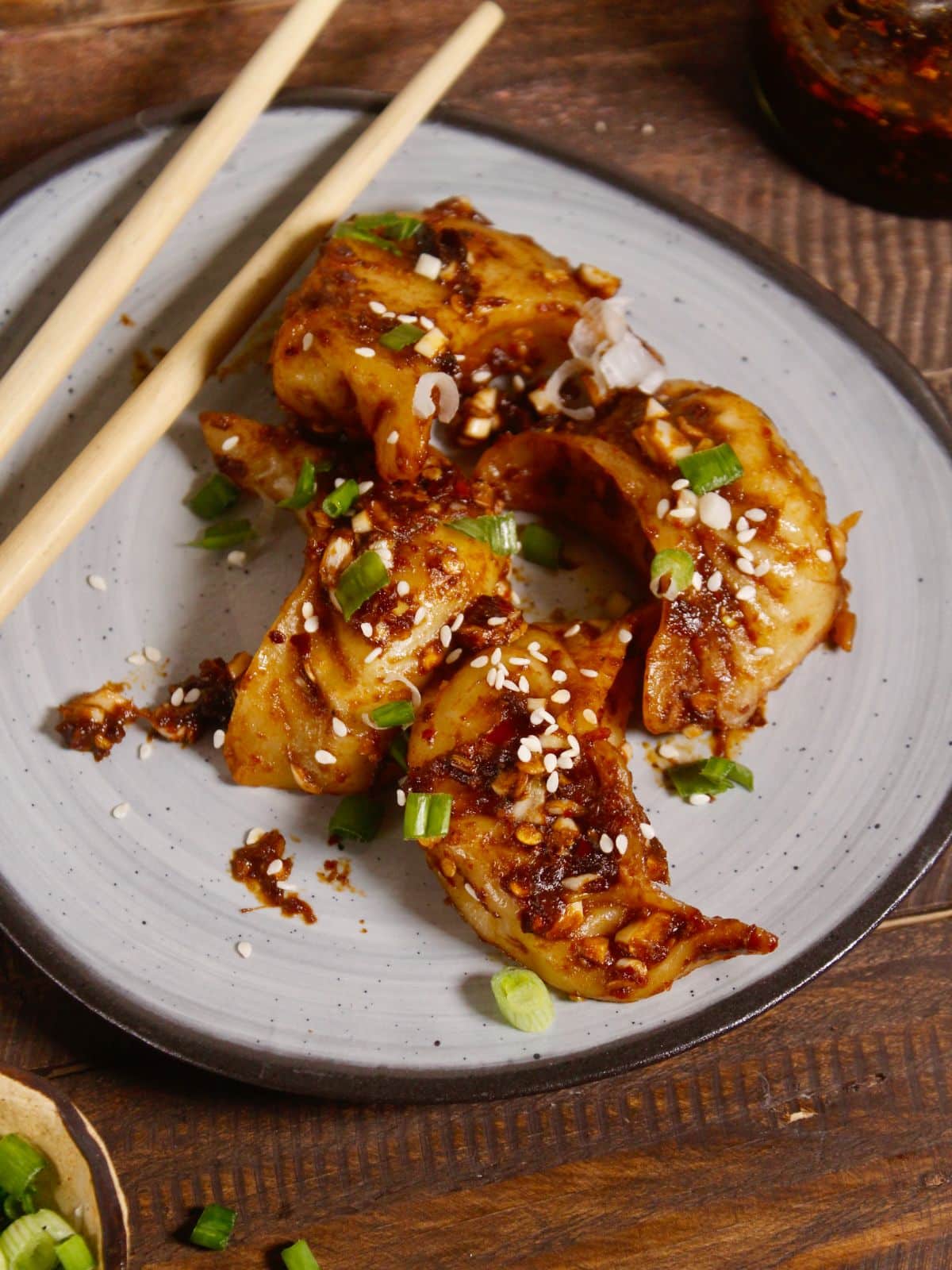 Top view image of fried dumpling with spicy sauce