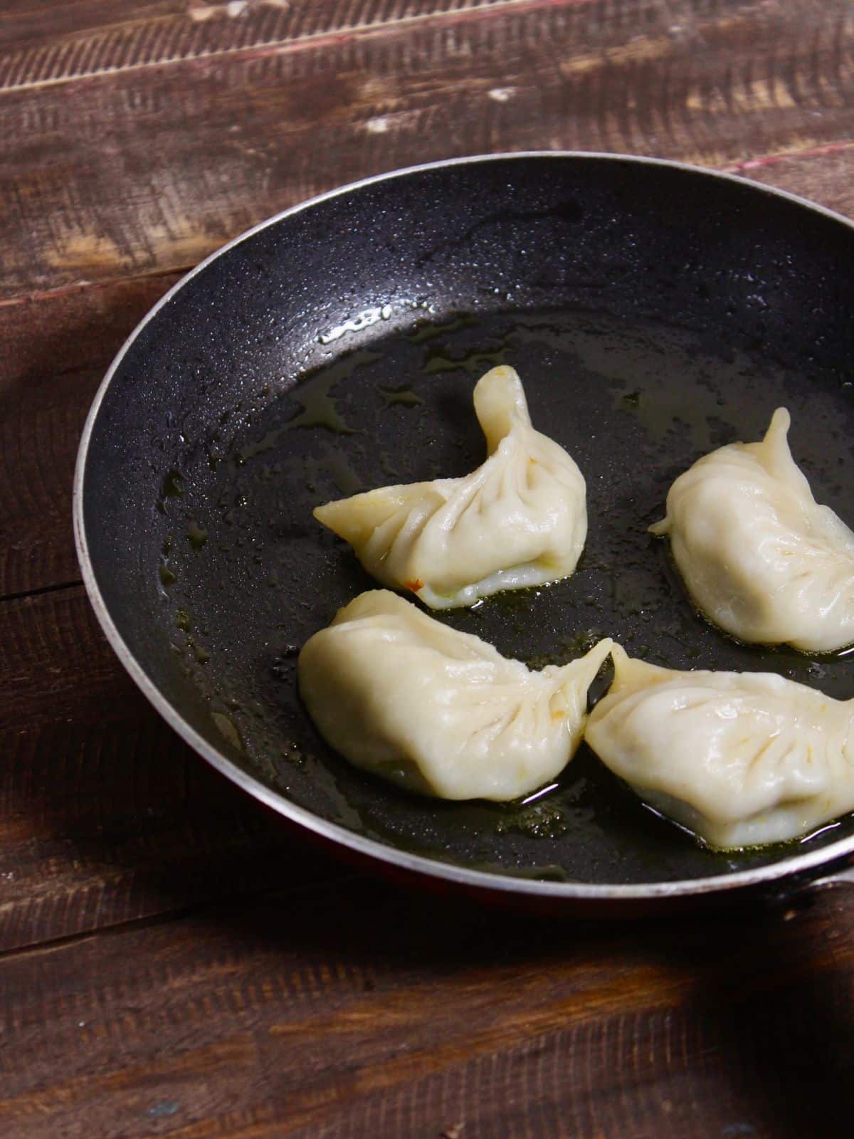 Take dumplings and fry it 