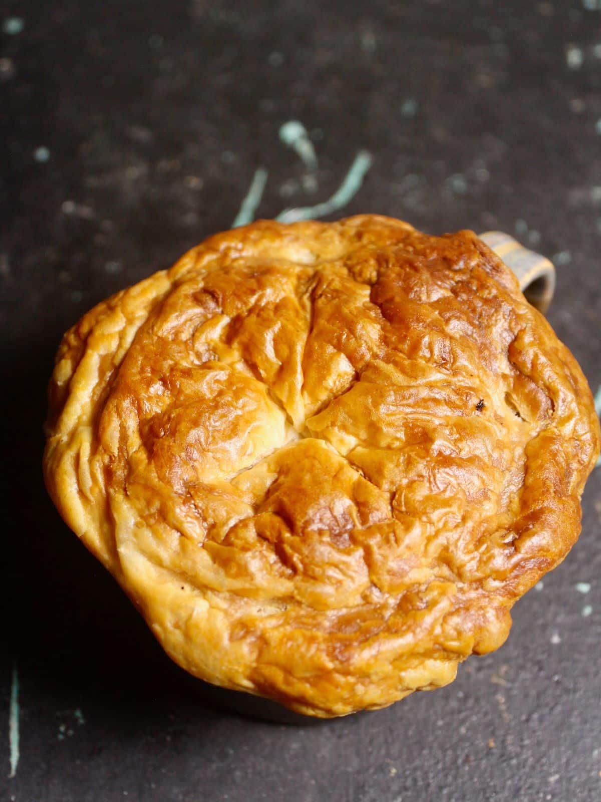 Top view of Indian Spiced Lamb and Vegetable Pies in a Cup