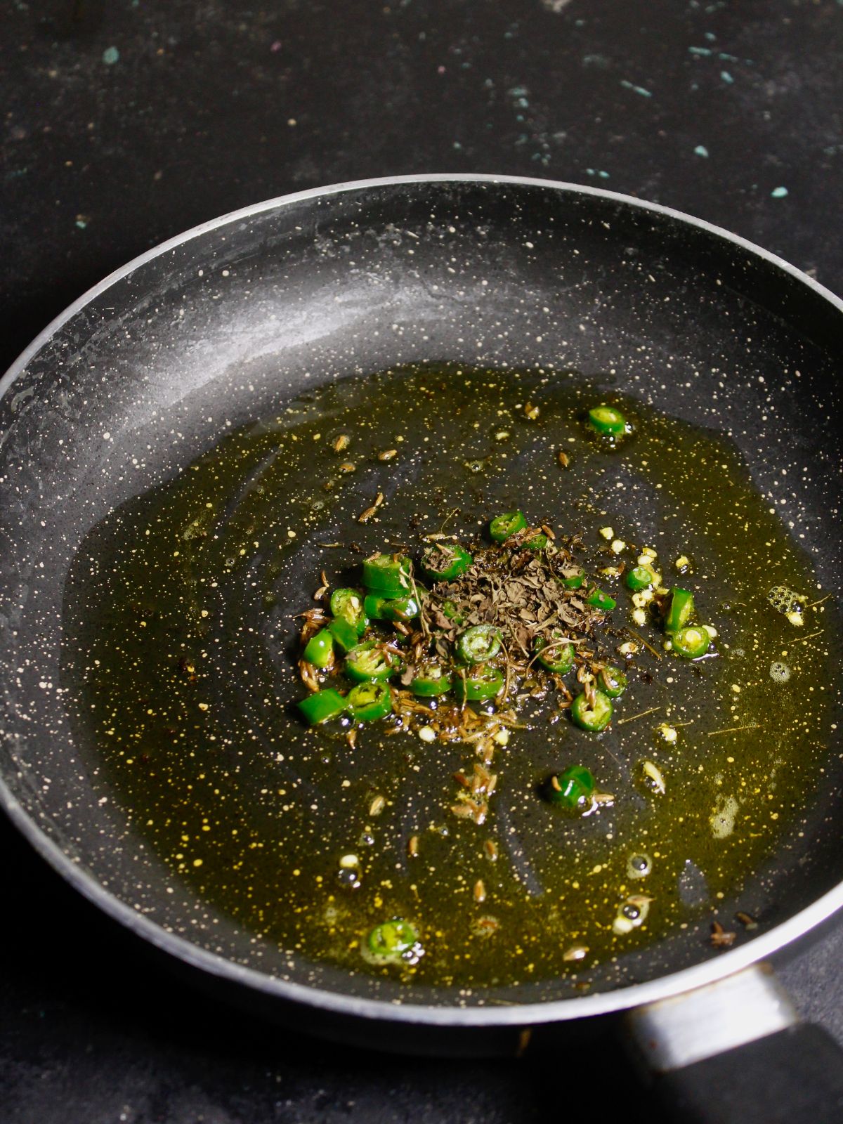 Add fenugreek seeds to the pan 