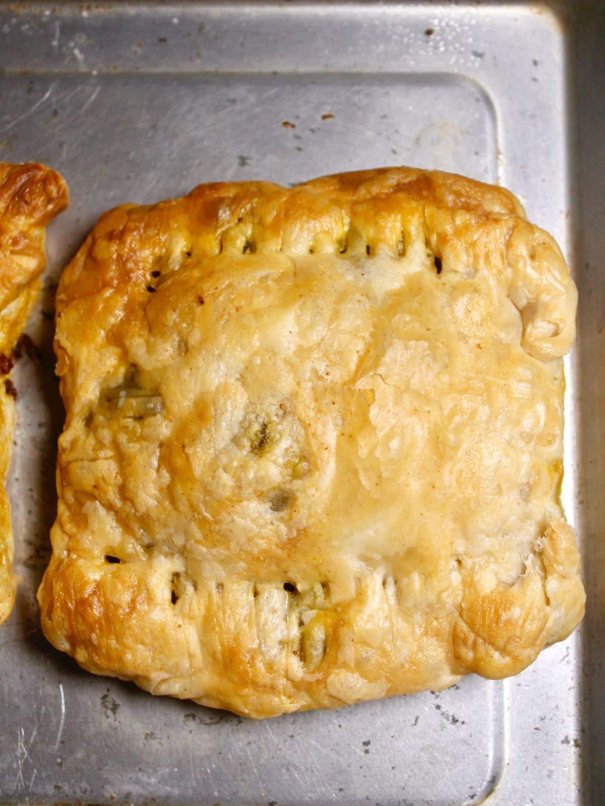 Top view of Minced Lamb Pastries with Spicy Mango Dressing