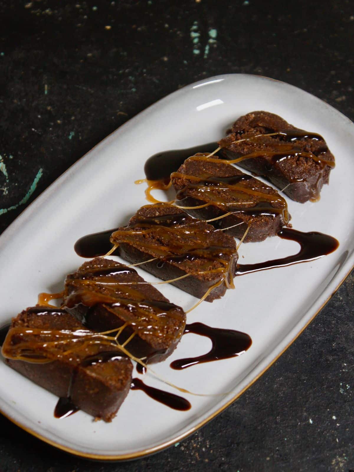 Drizzle chocolate sauce and caramel sauce and enjoy 