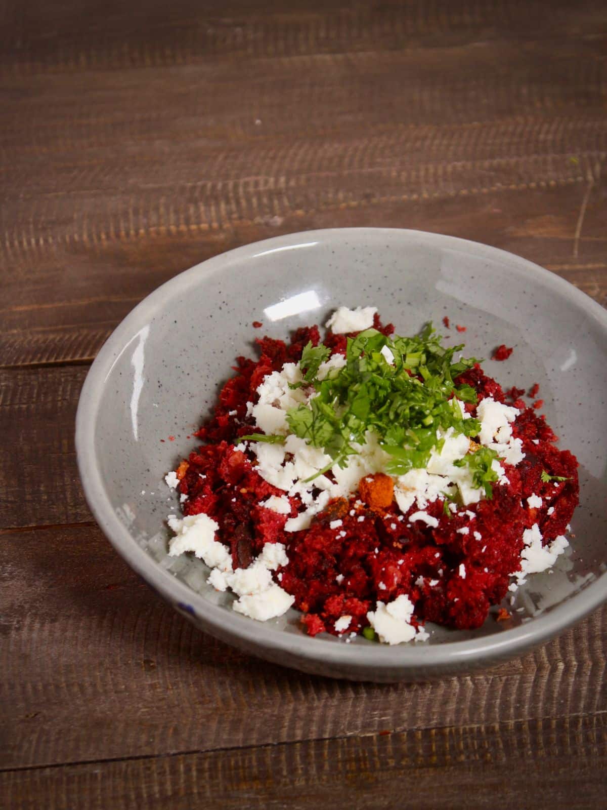 add cottage cheese and chopped coriander leaves and mix well