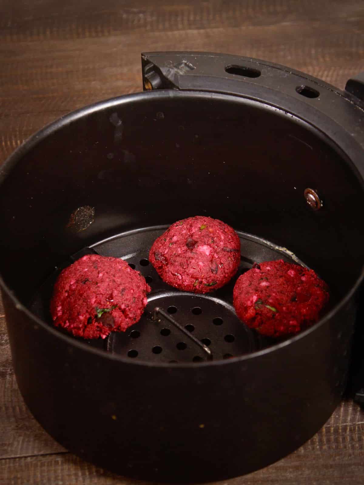 transfer the dough rounds into air fryer 