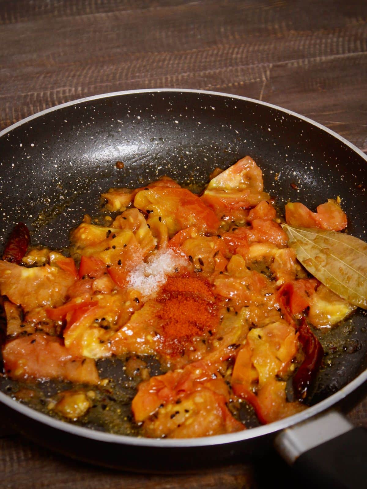 add chili powder and salt to the pan 