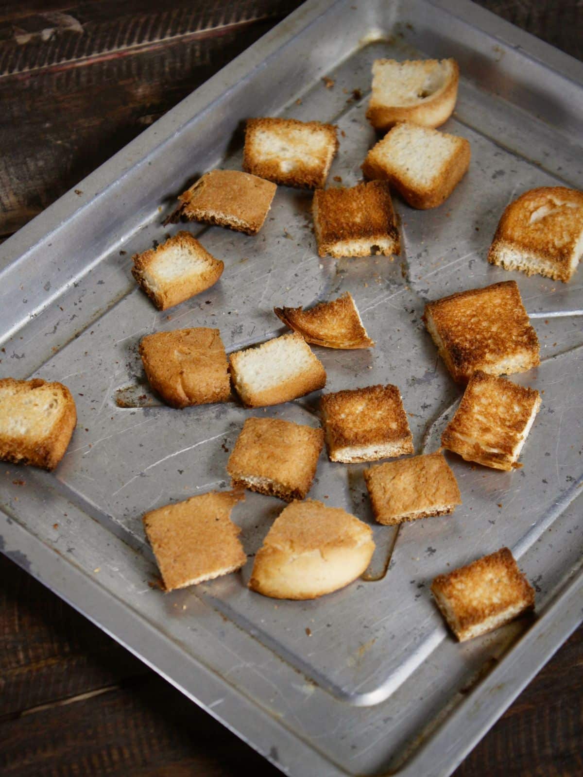 roast the bread cubes in an oven 
