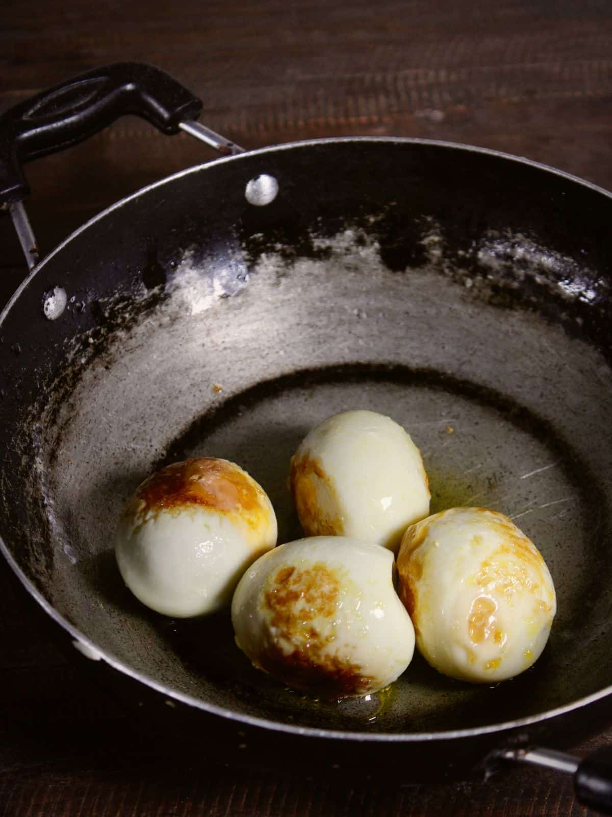Fry the boiled egg in a pan 