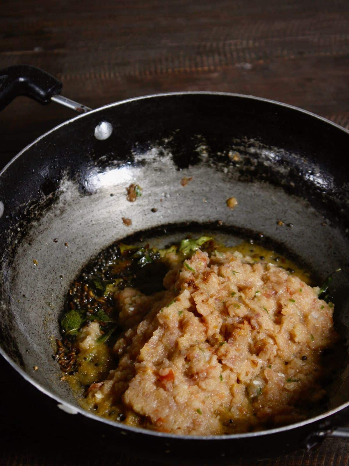 Add tomato paste in the pan 