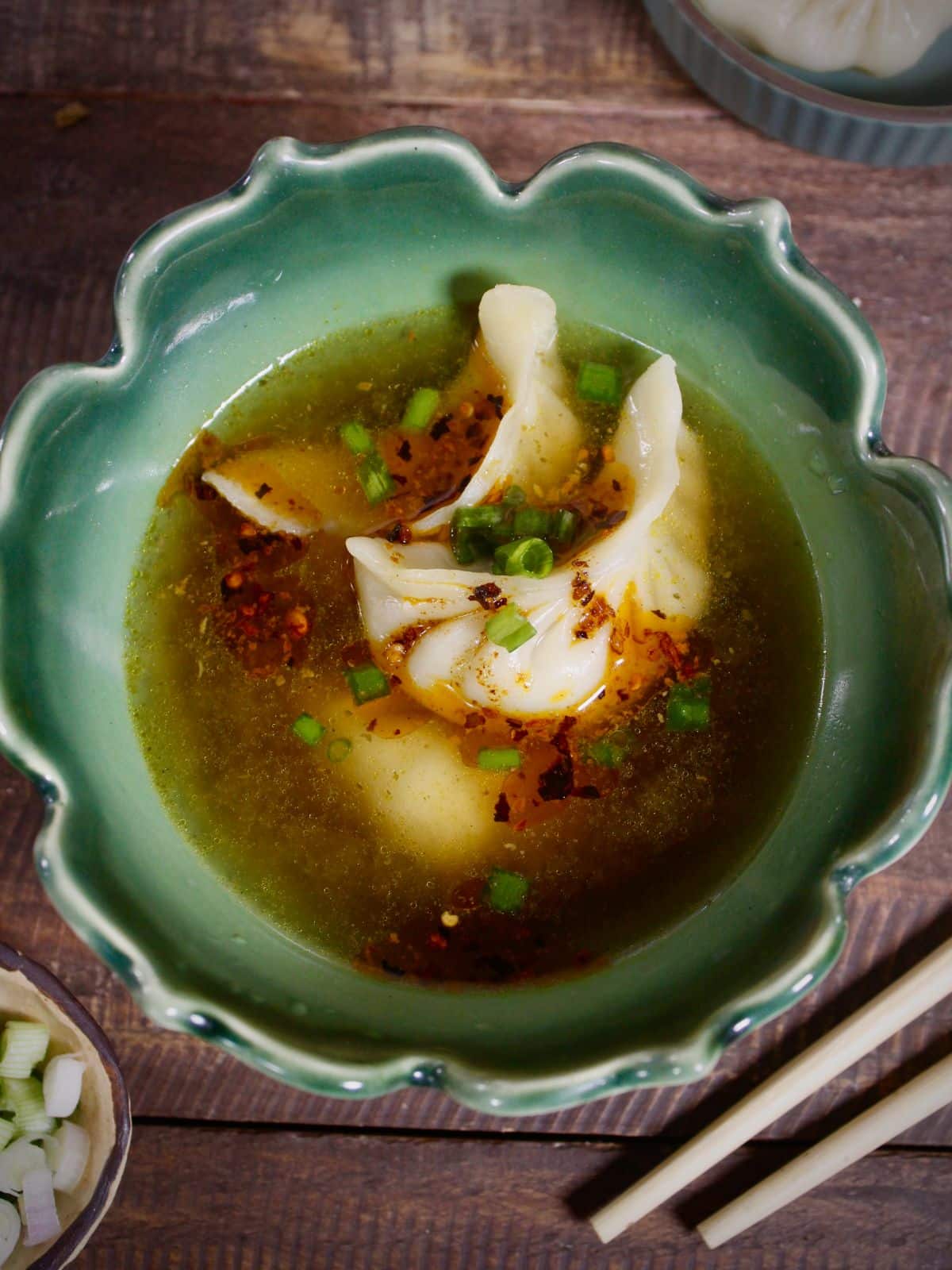 Top view of dumplings with warm broth