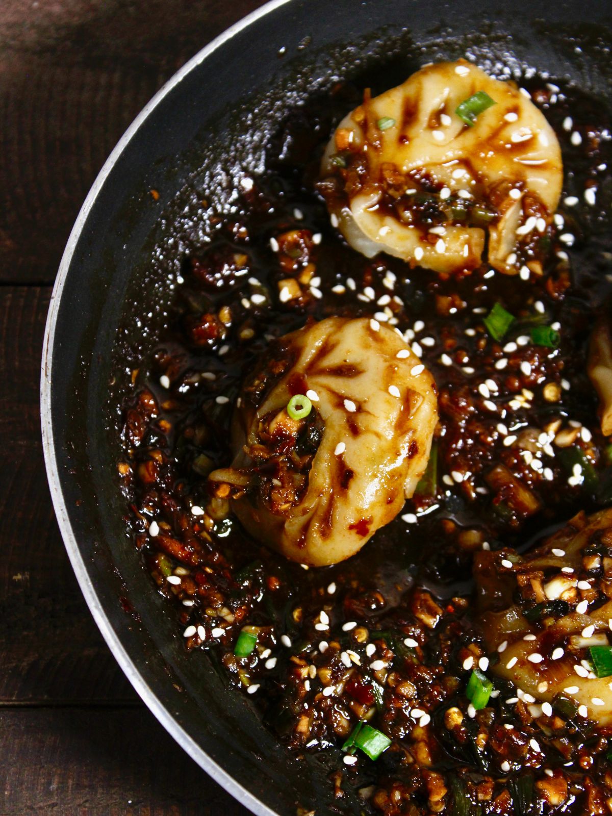 side top view of dumplings with hot garlic sauce