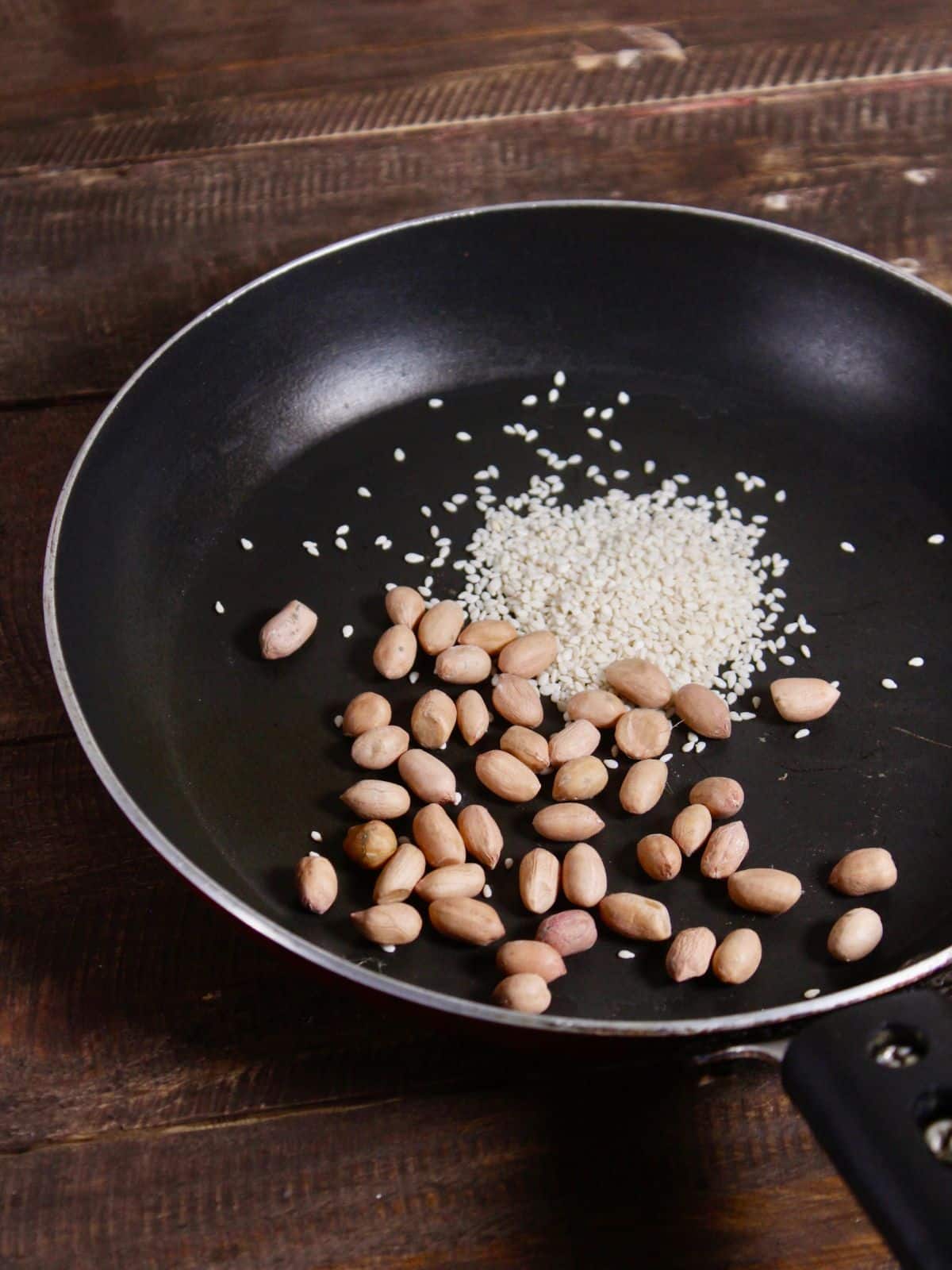 dry roast peanuts and sesame seeds 