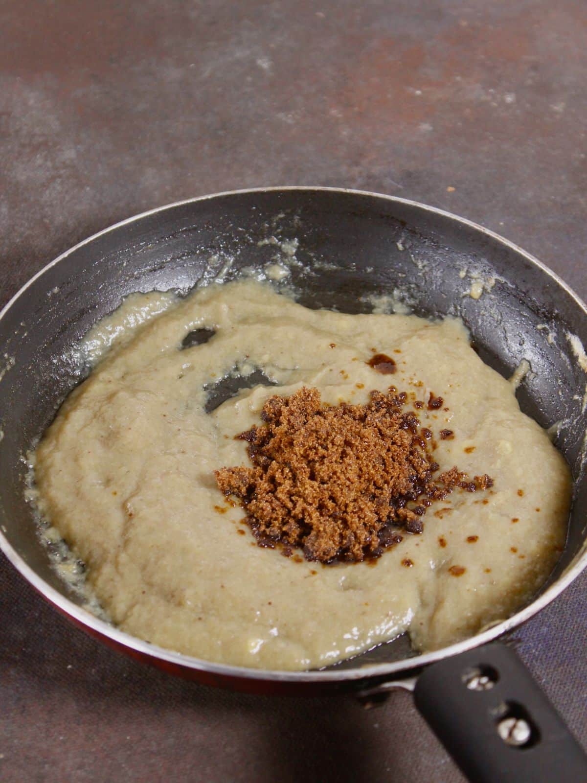 add jaggery power over it and mix well