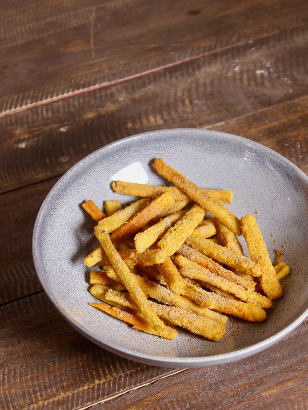 sprinkle the masala mixture over the fried banana stem chips and enjoy  