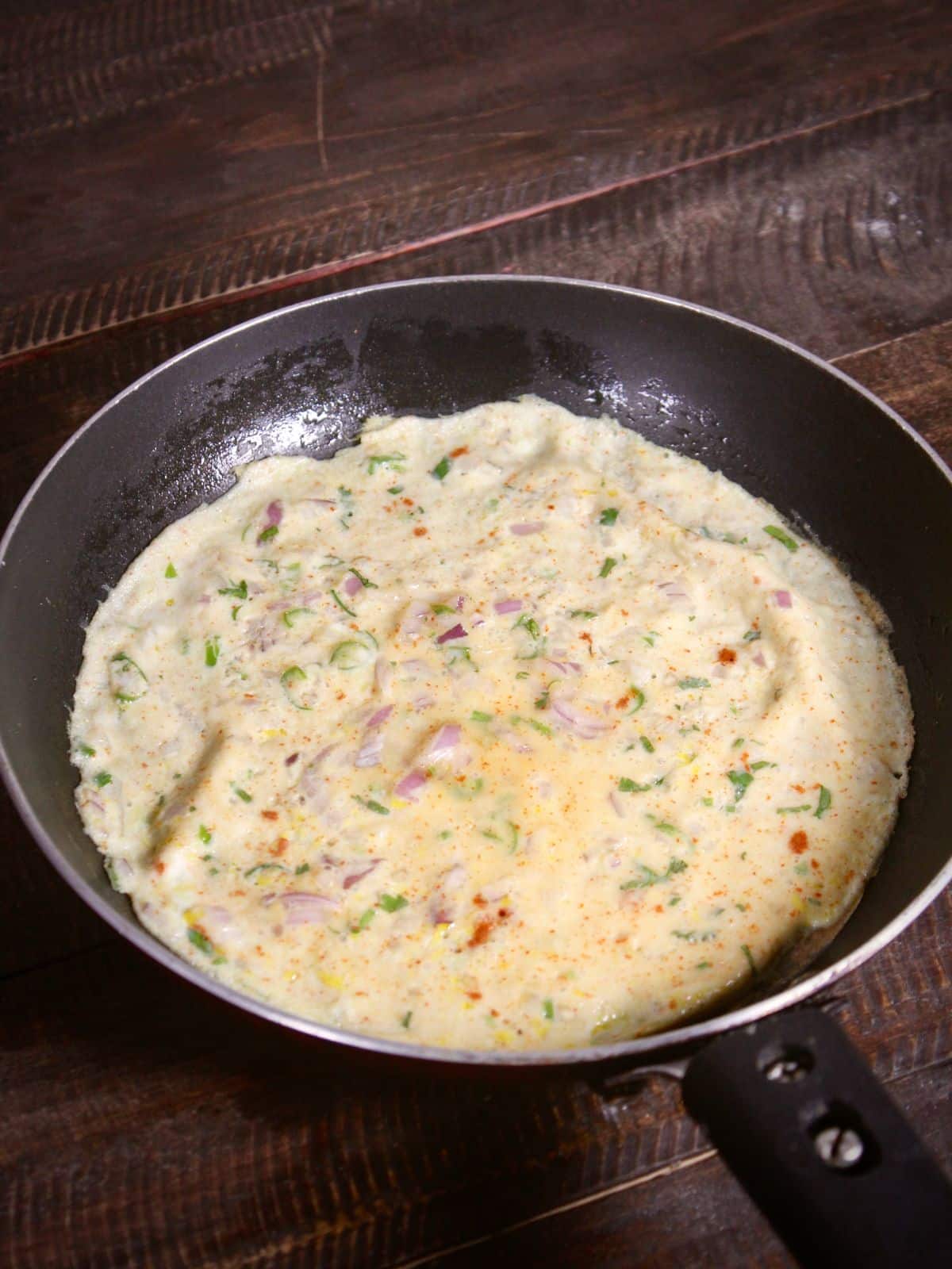 cook egg in a pan and flip until its golden brown in color  