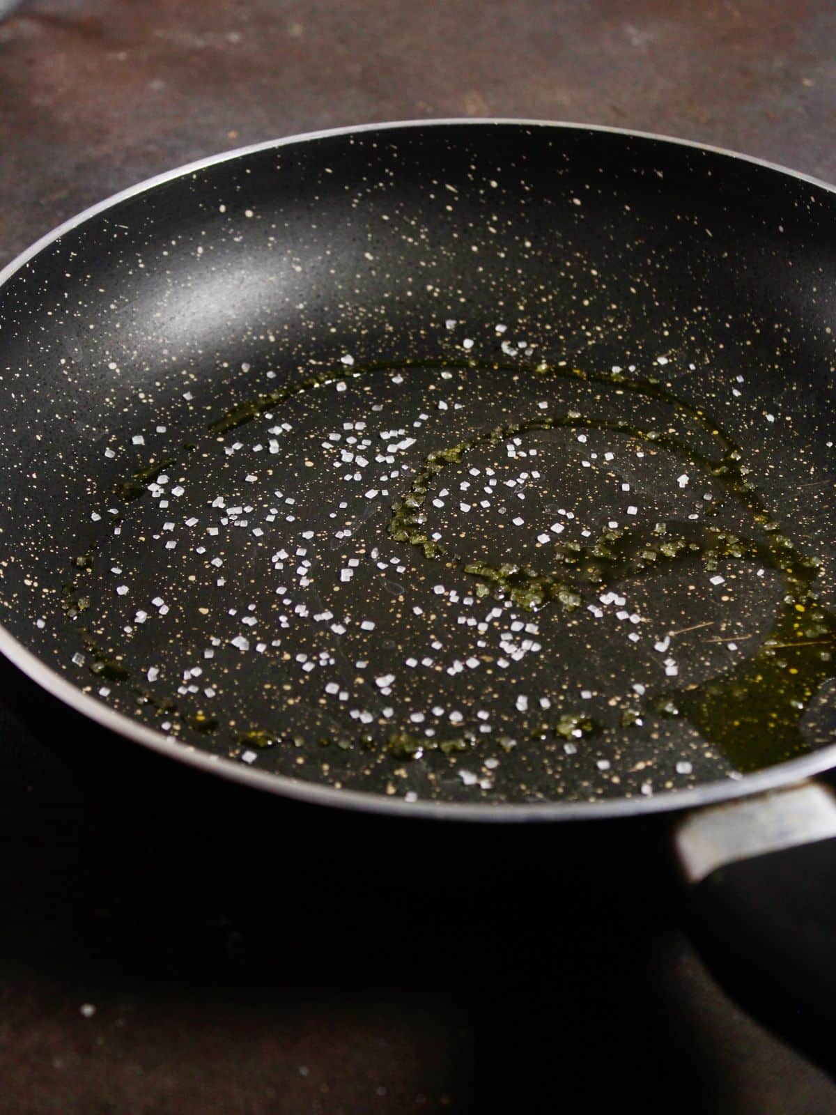sprinkle rest of the sugar on a pan 