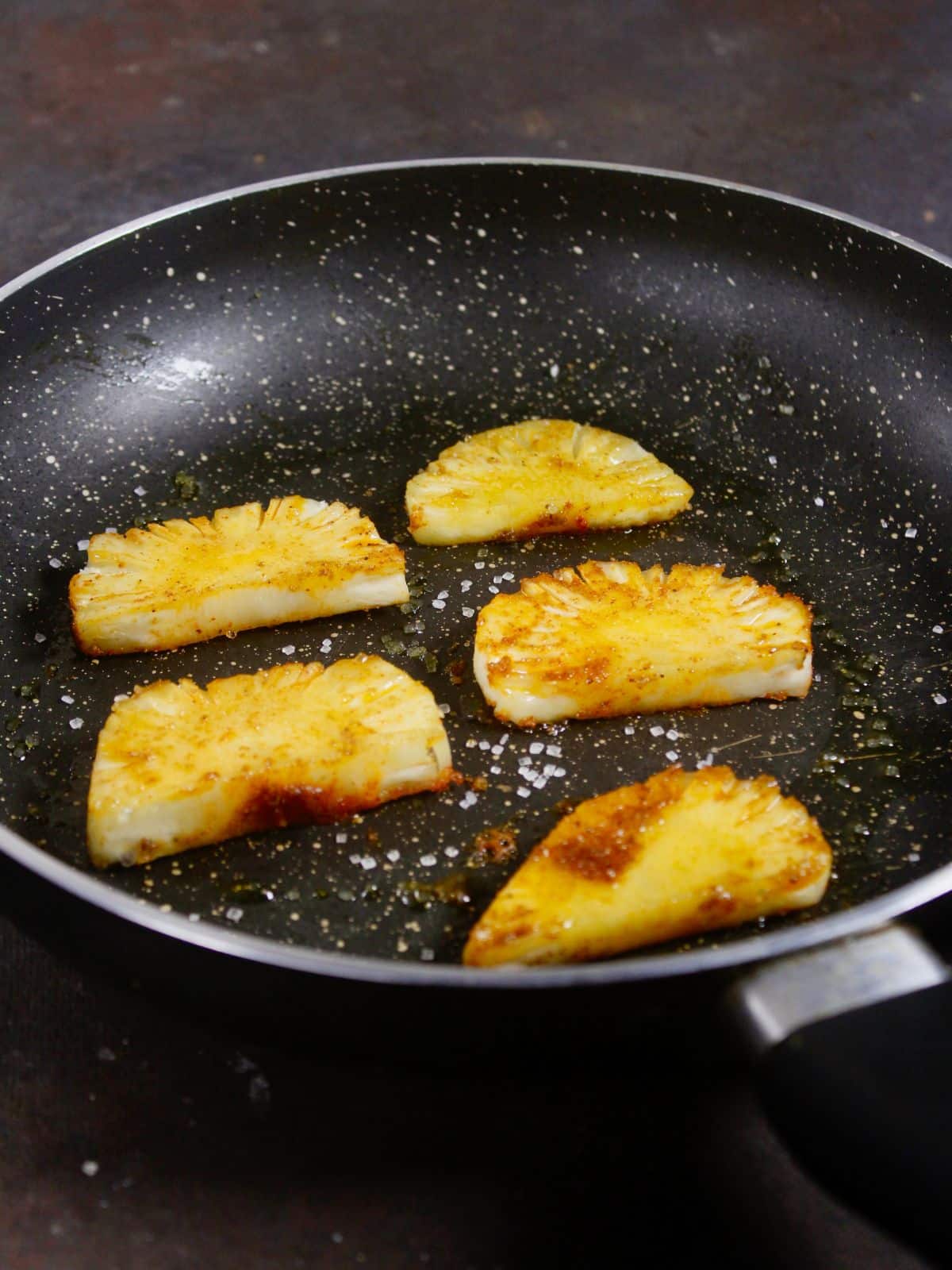 cook the pineapples on a pan 
