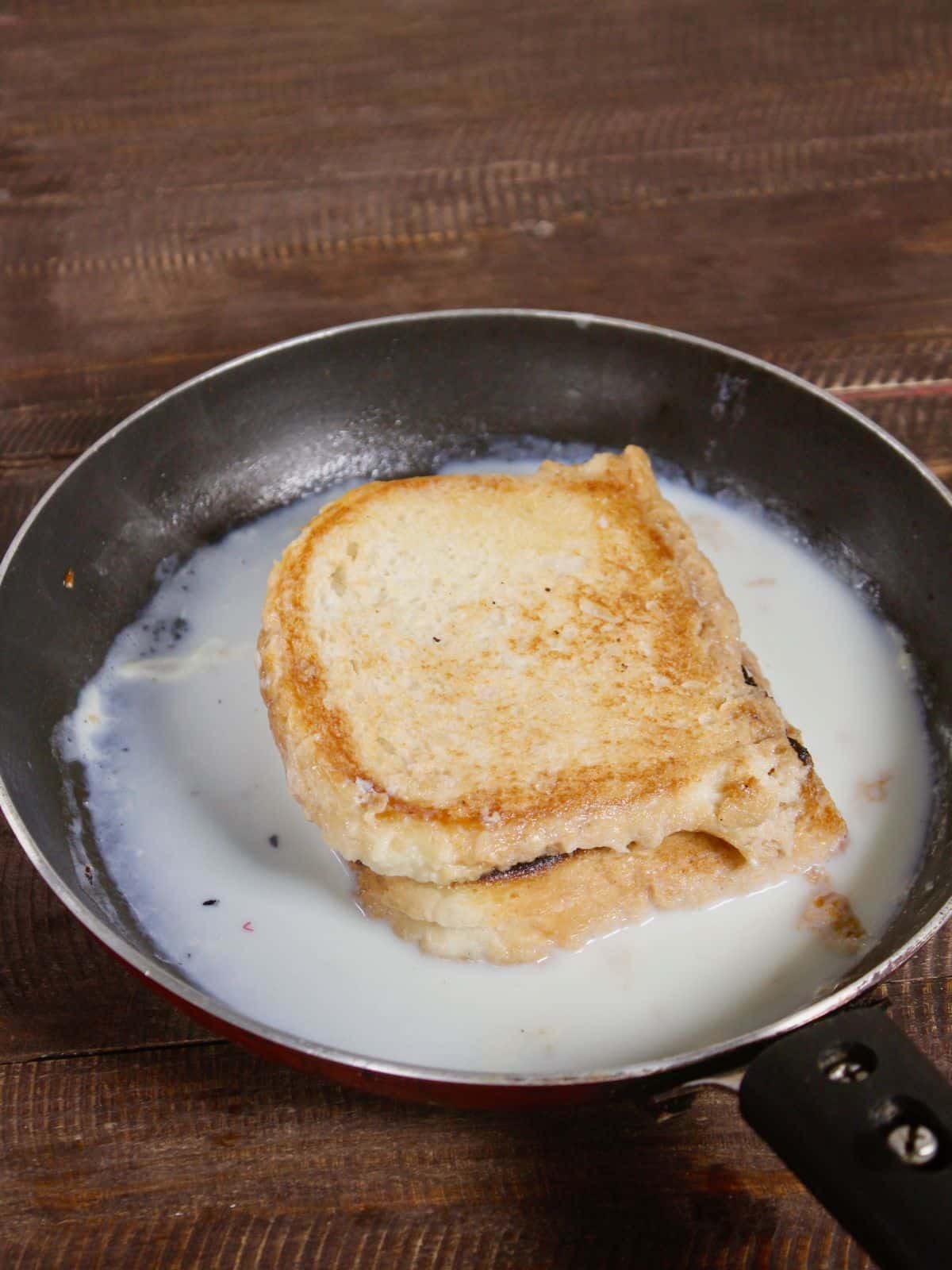 flip the toast and cook until the milk it dried 