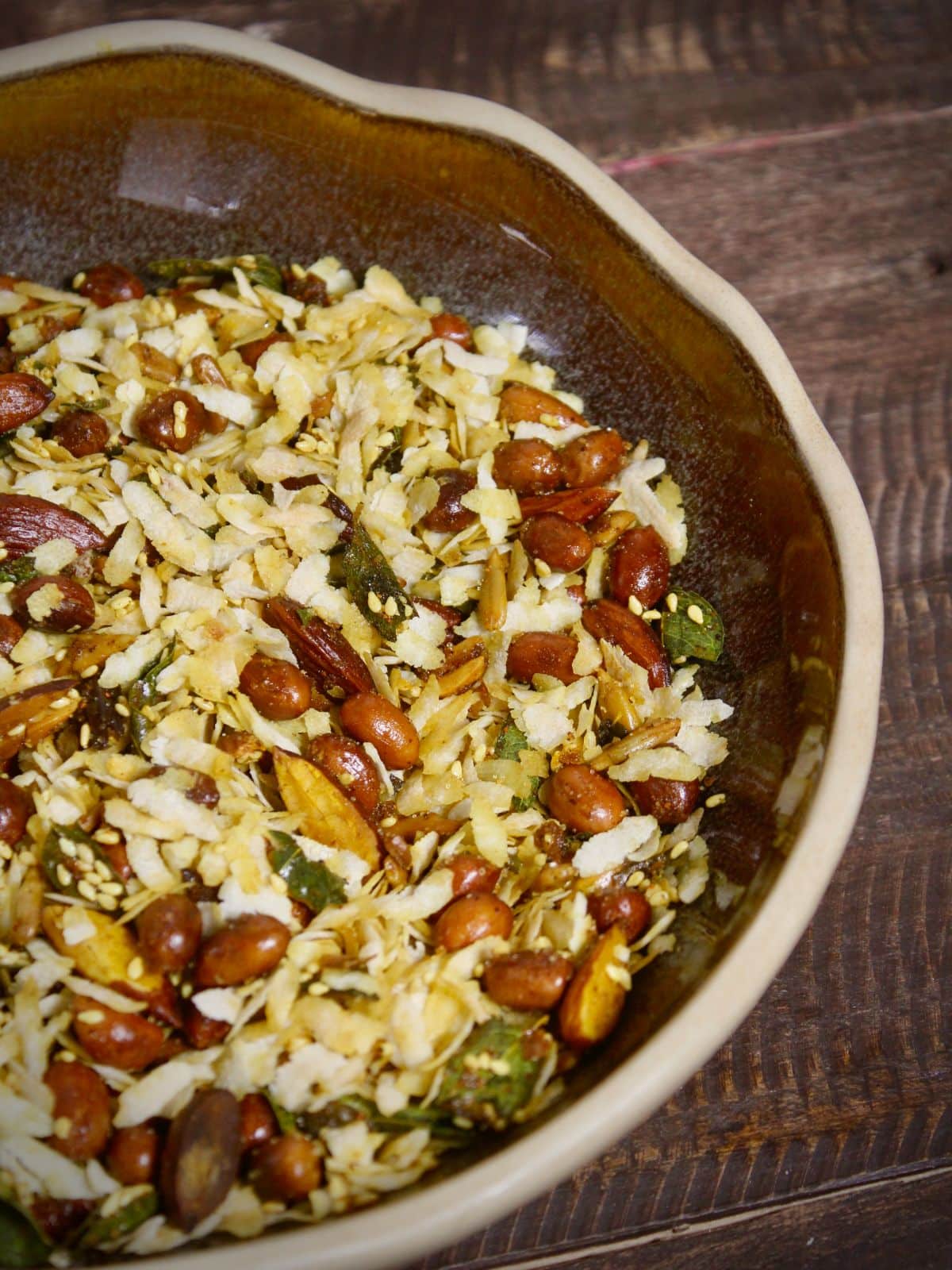 half bowl image of oven roasted poha chivda