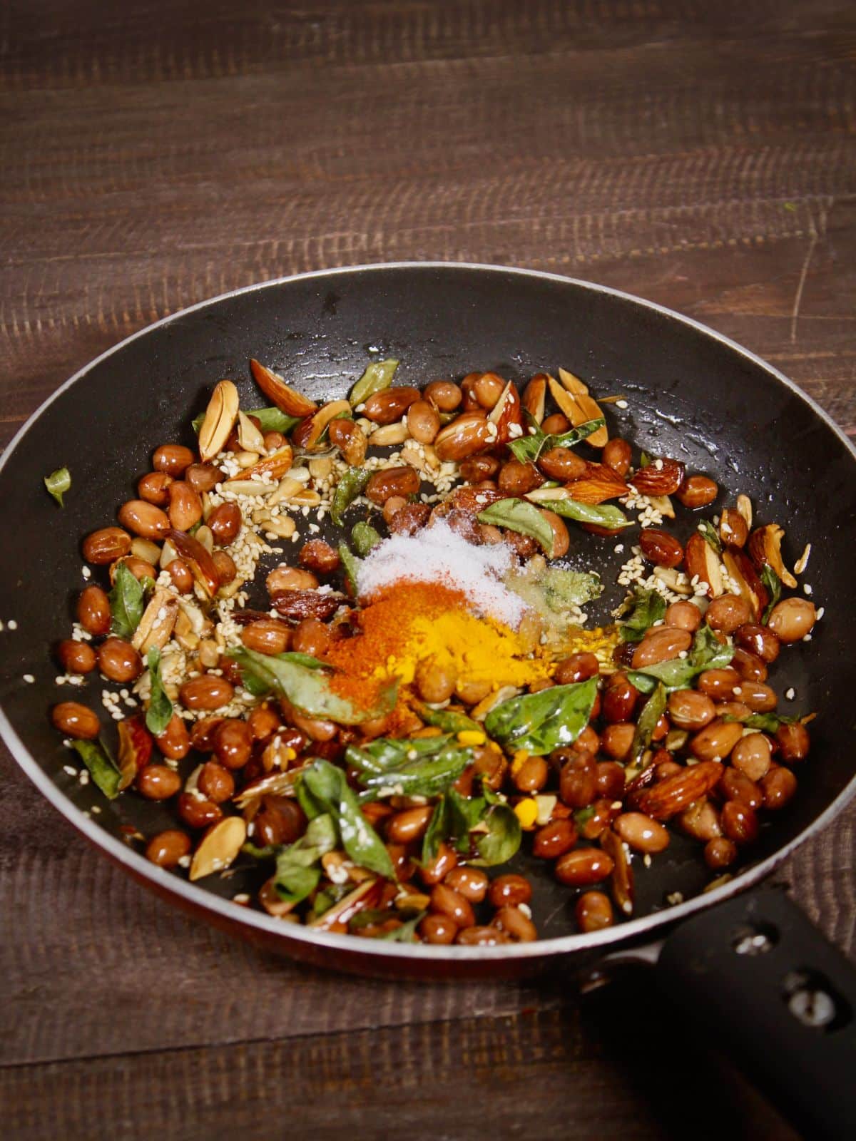 add powdered spices to the pan and saute 