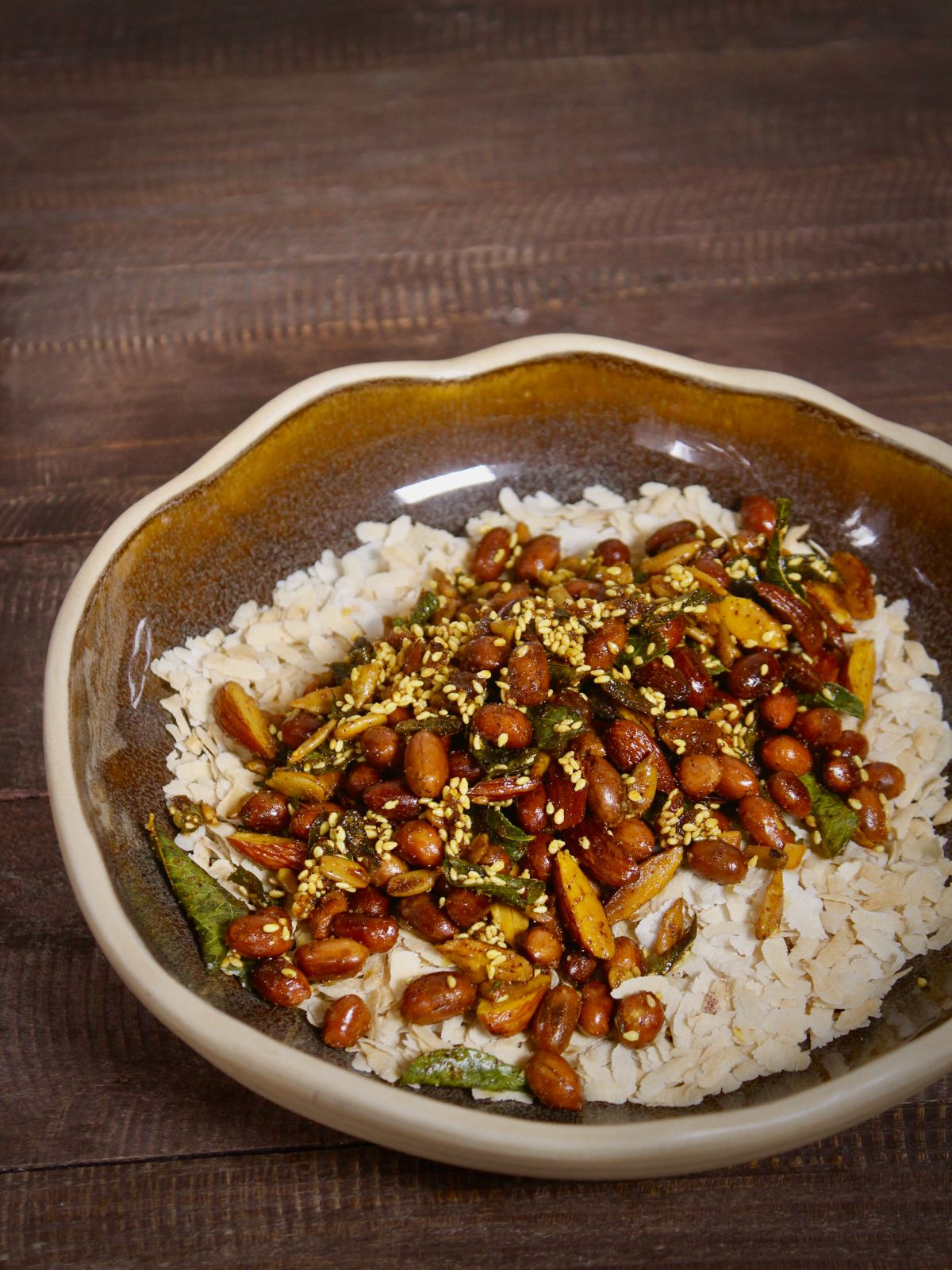 mix peanuts mixture over the flattened rice and enjoy your oven roasted poha chivda