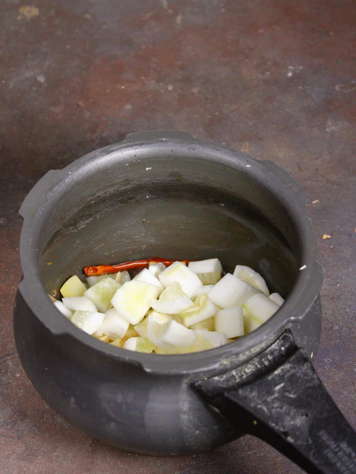 add chopped cucumbers to the cooker 