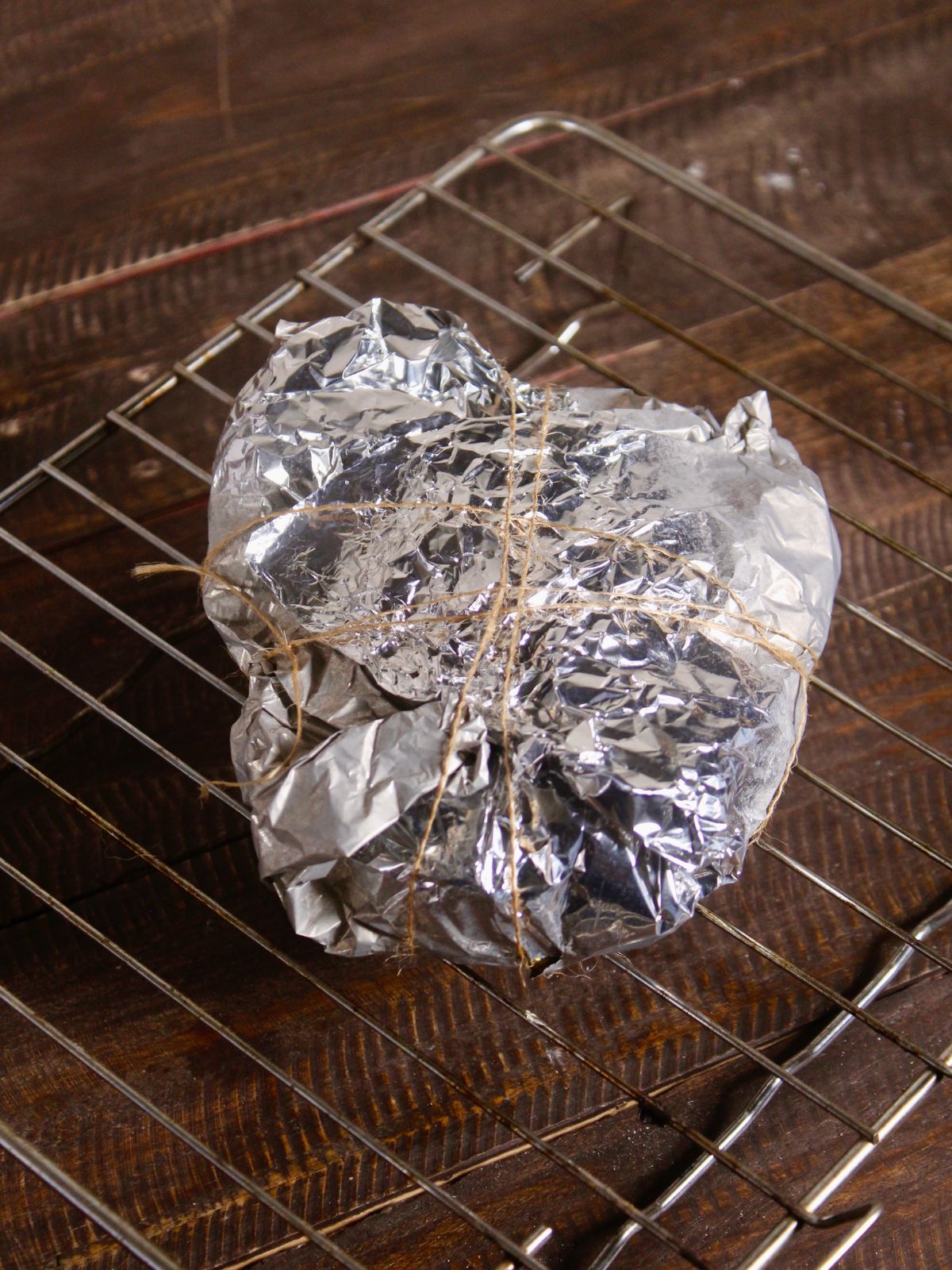 cover the foil on top and seal it with a thread