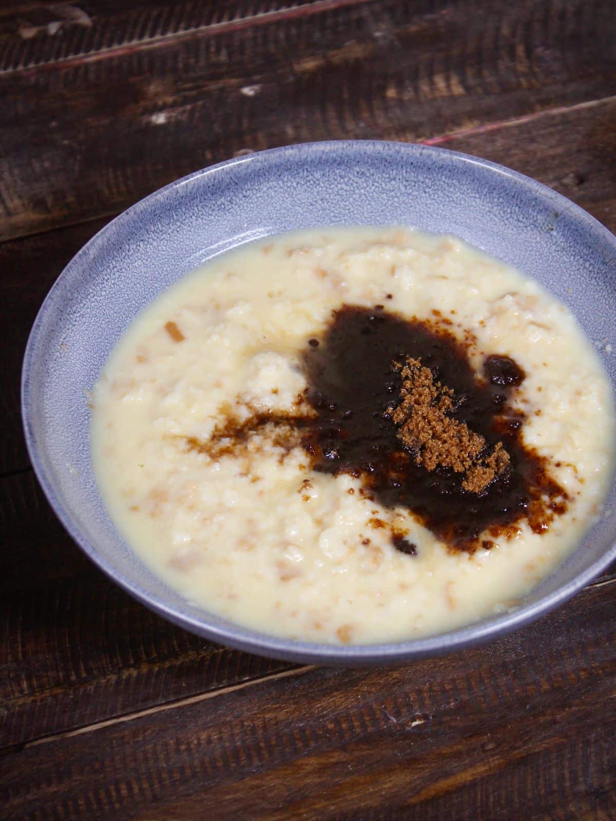 add vanilla essence and jaggery powder in a bowl  and mix well