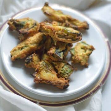 Air-Fryer Mirchi Vada on a white plate.