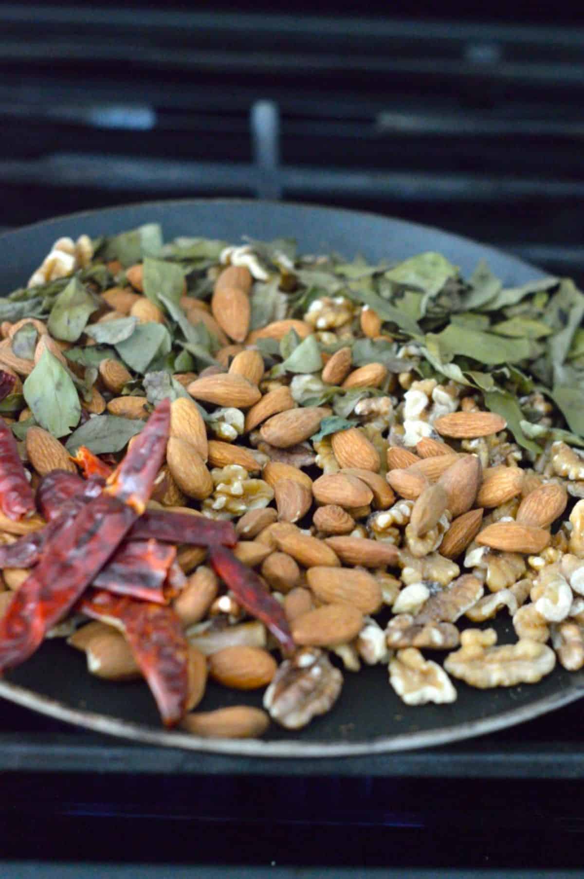 Air-Fryer Nuts ingredients on a blue plate.