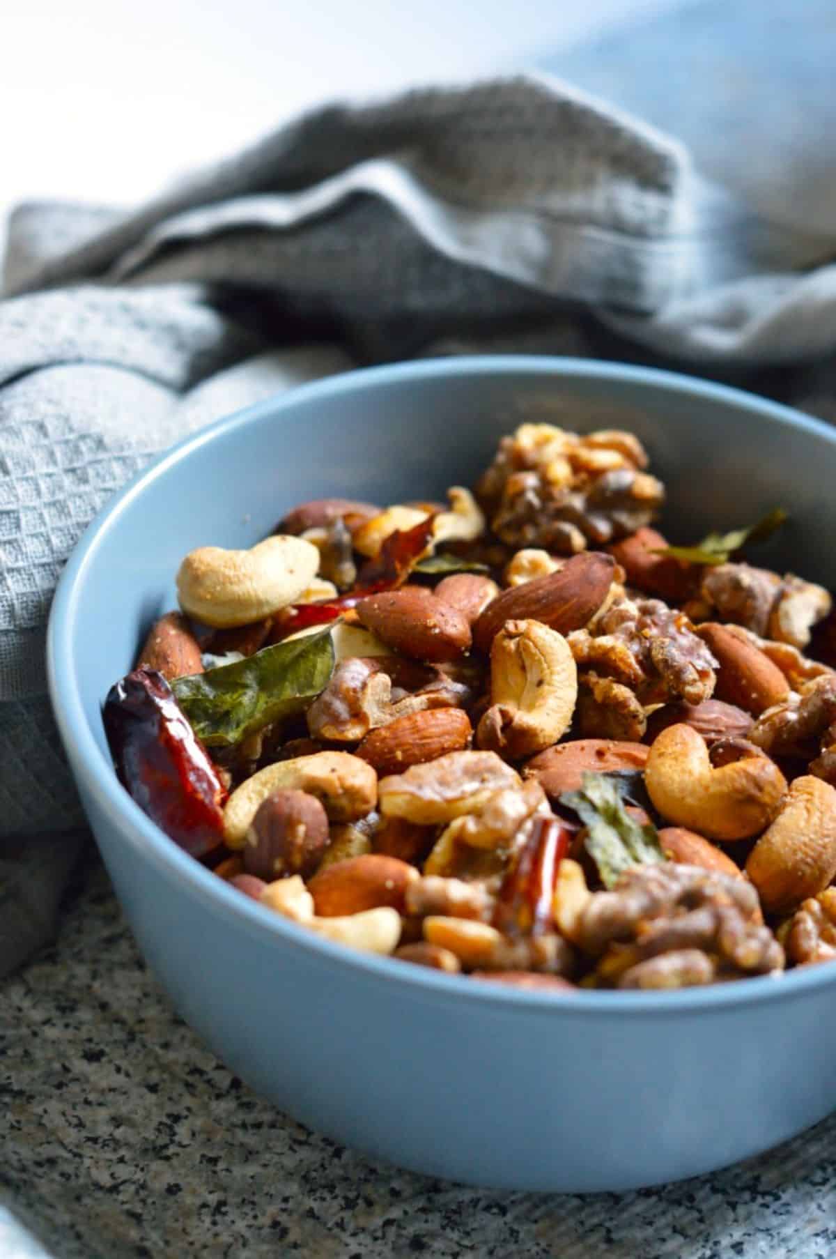 Air-Fryer Nuts in a blue bowl.