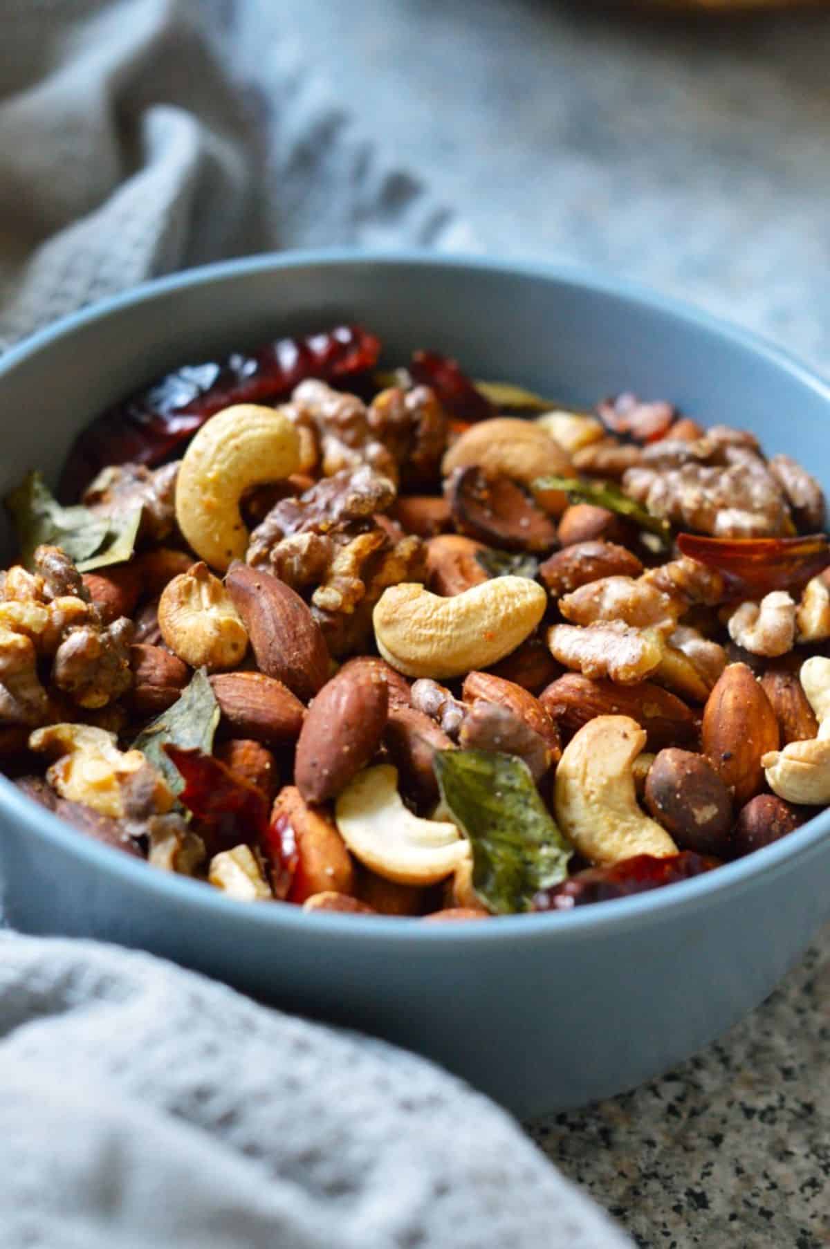 Air-Fryer Nuts in a blue bowl.