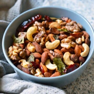 Air-Fryer Nuts in a blue bowl.