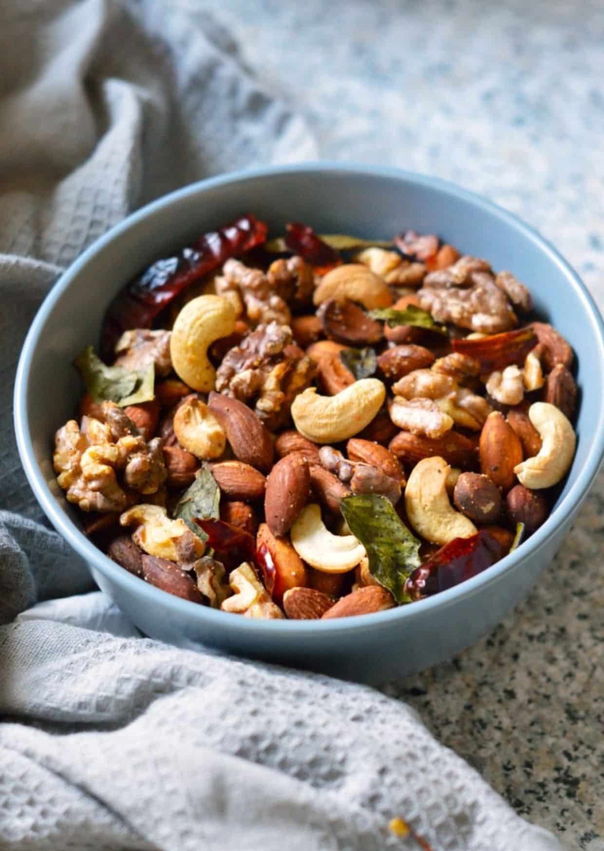 Air-Fryer Nuts in a blue bowl.