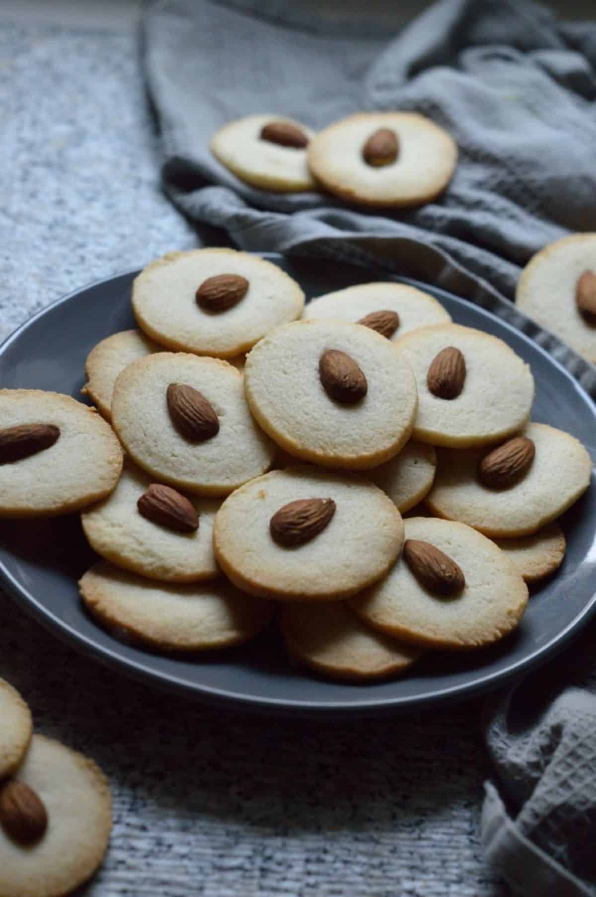 Badam Cookies on a gray tray.