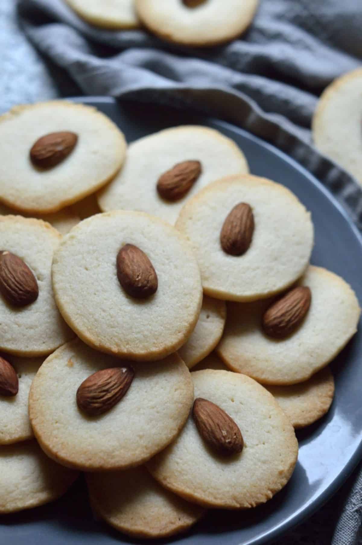 Badam Cookies on a gray tray.