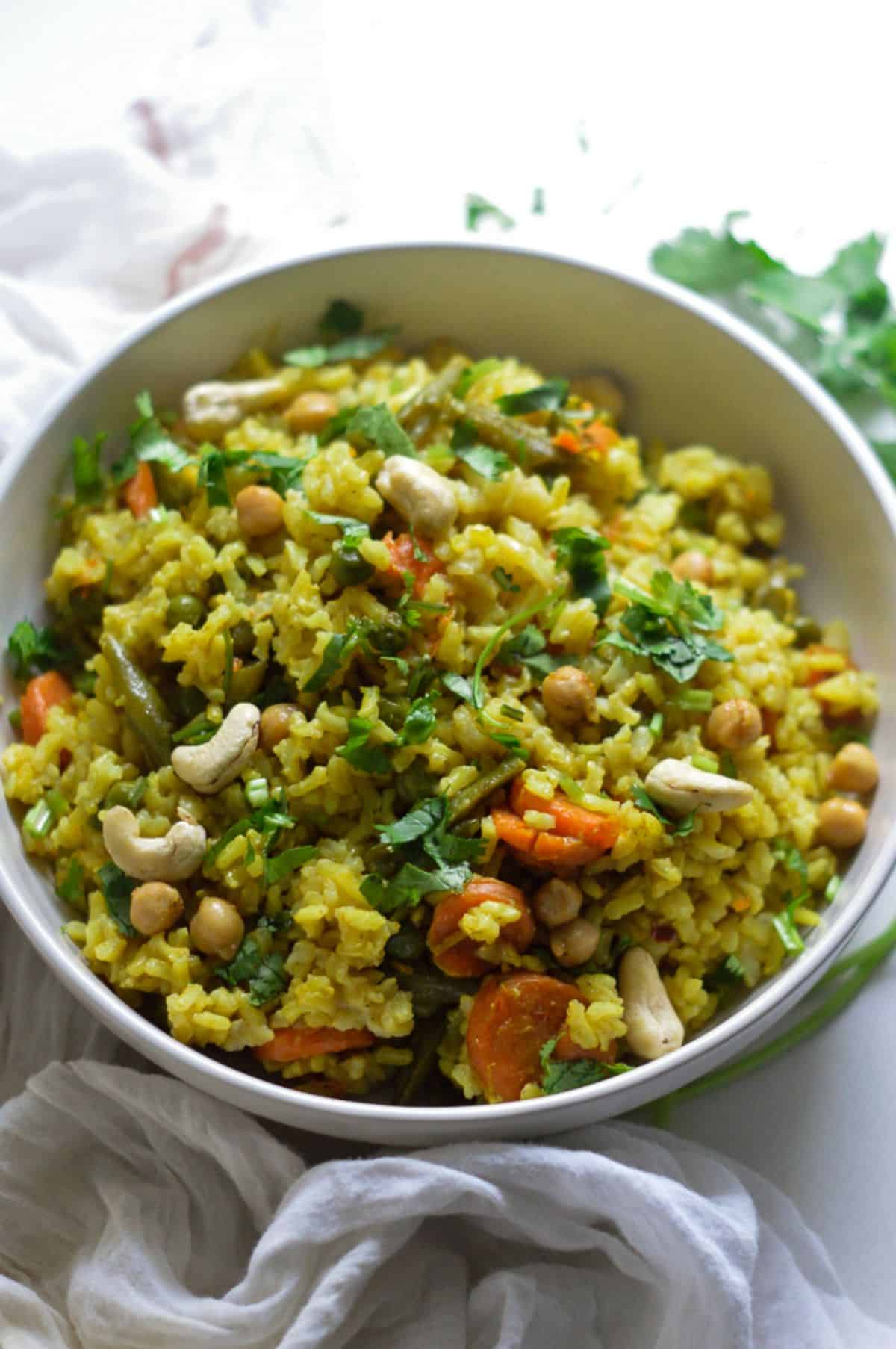 Brown Rice Masala Pilaf in a white bowl.