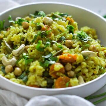 Brown Rice Masala Pilaf in a white bowl.