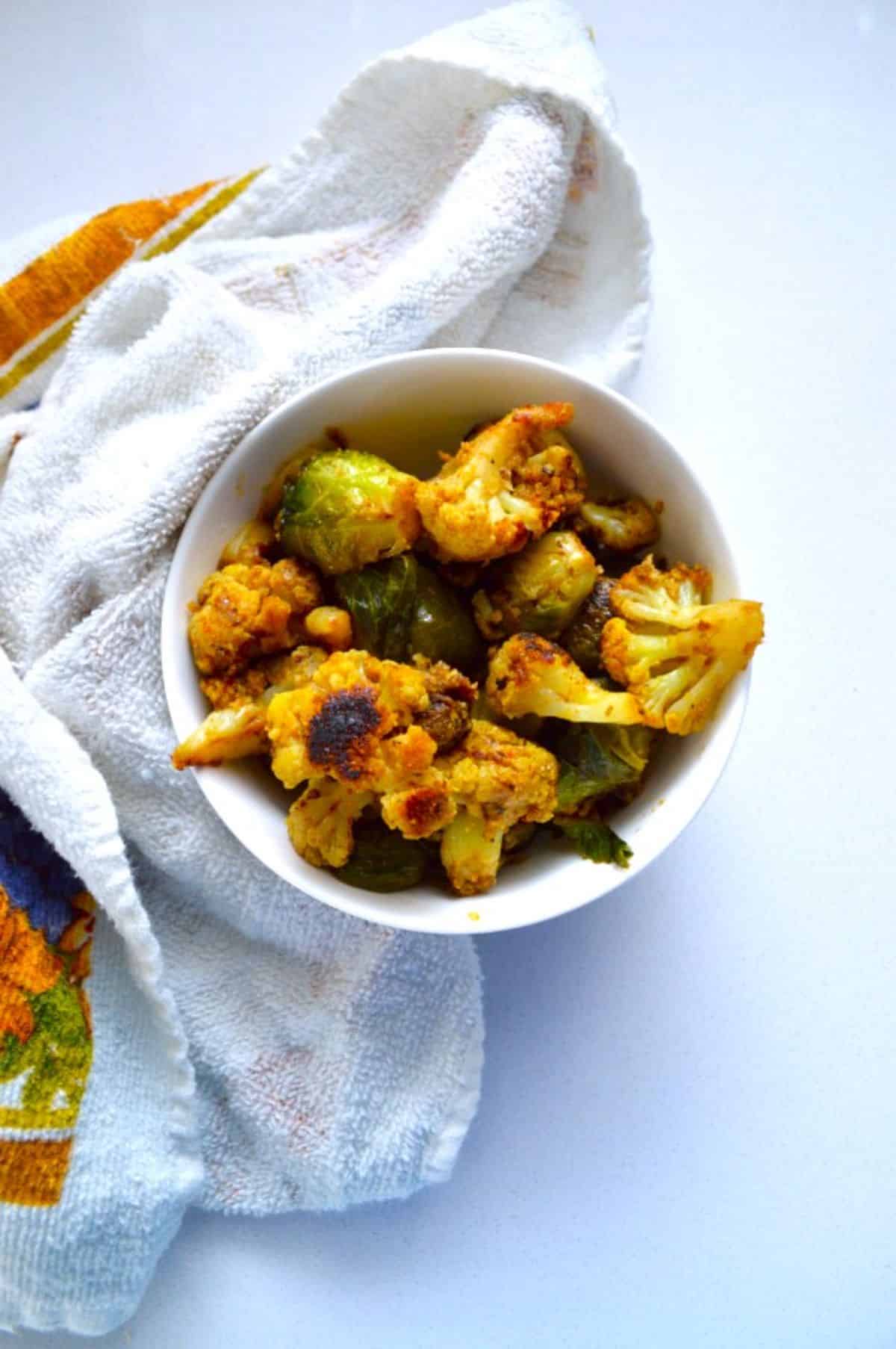 Brussels Sprouts Gobi Sabzi in a white bowl.