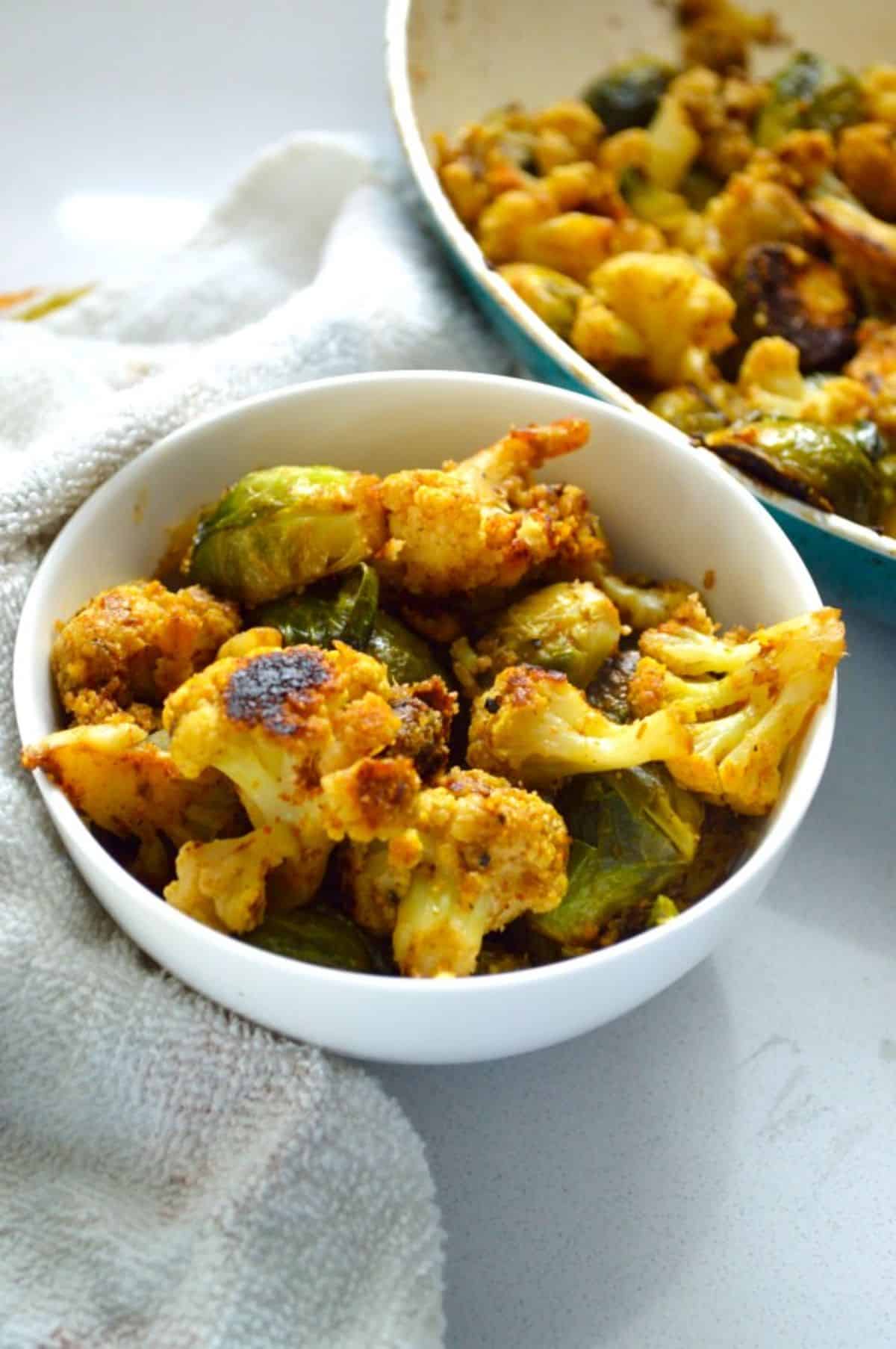 Brussels Sprouts Gobi Sabzi in a white bowl.