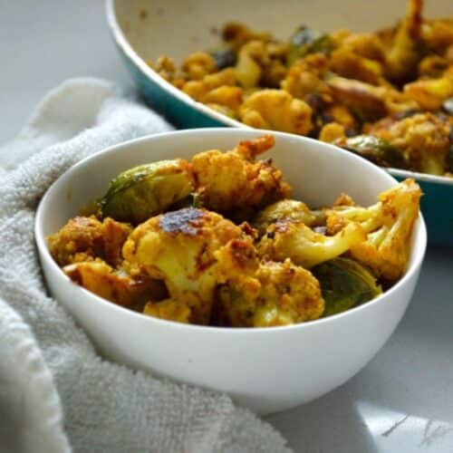 Brussels Sprouts Gobi Sabzi in a white bowl.
