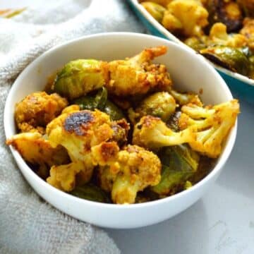 Brussels Sprouts Gobi Sabzi in a white bowl.