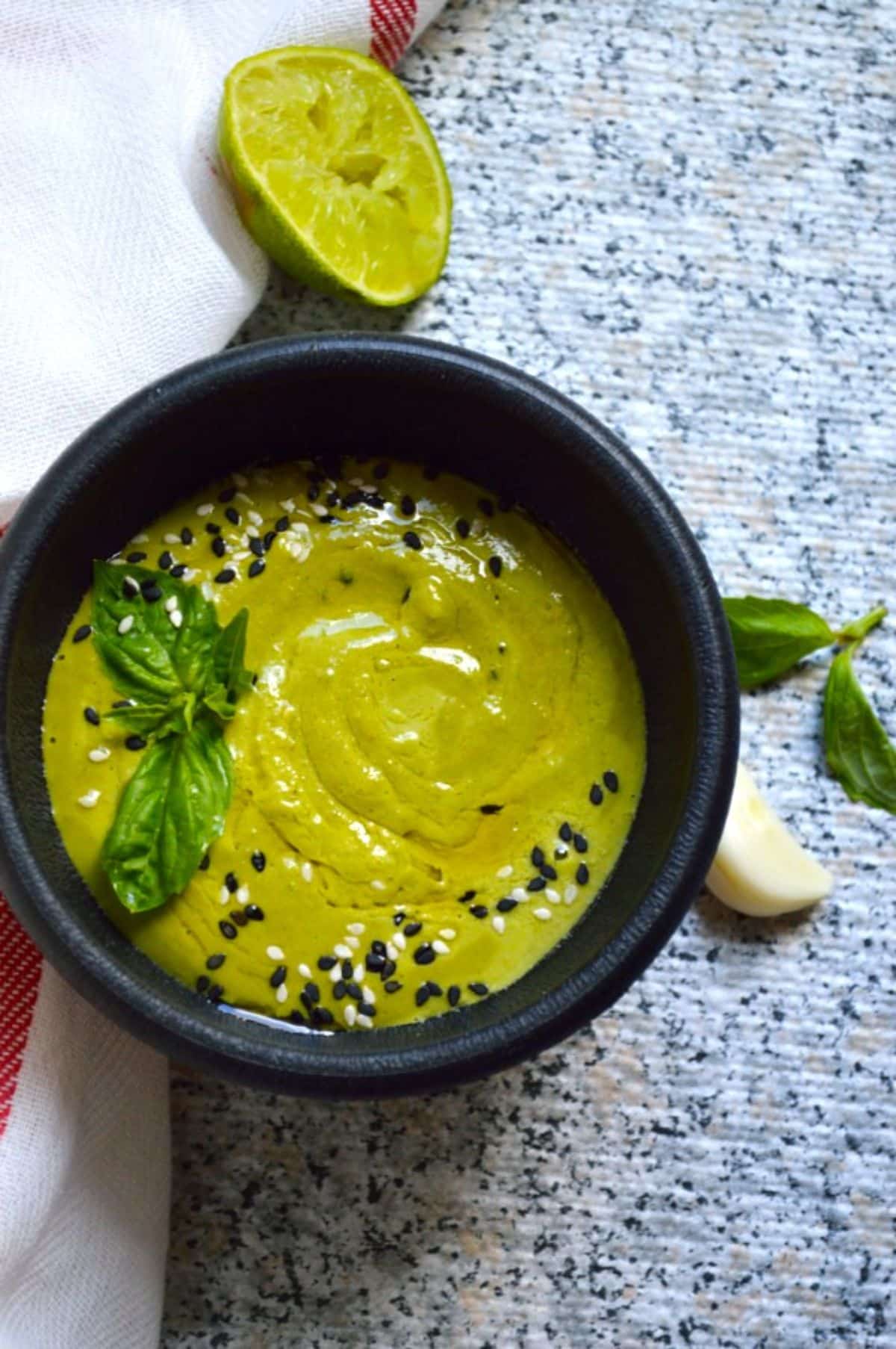 Curry Pesto in a black bowl.