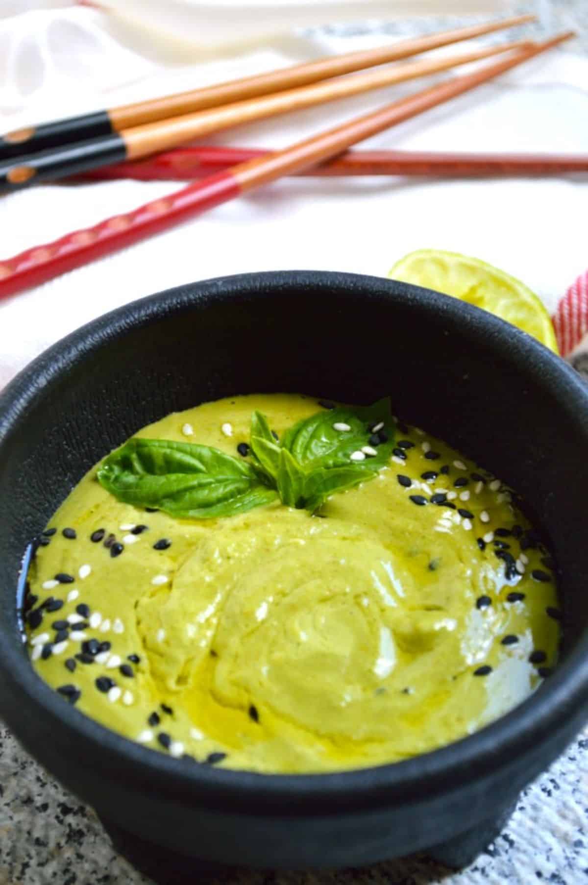 Curry Pesto in a black bowl.